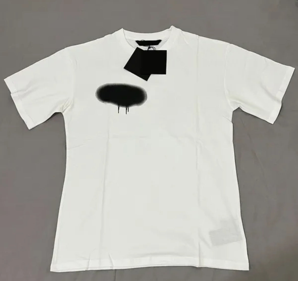 Designer Men's and Women's All White Coloured T-shirts Summer
Fashion Spray Painting Graffiti