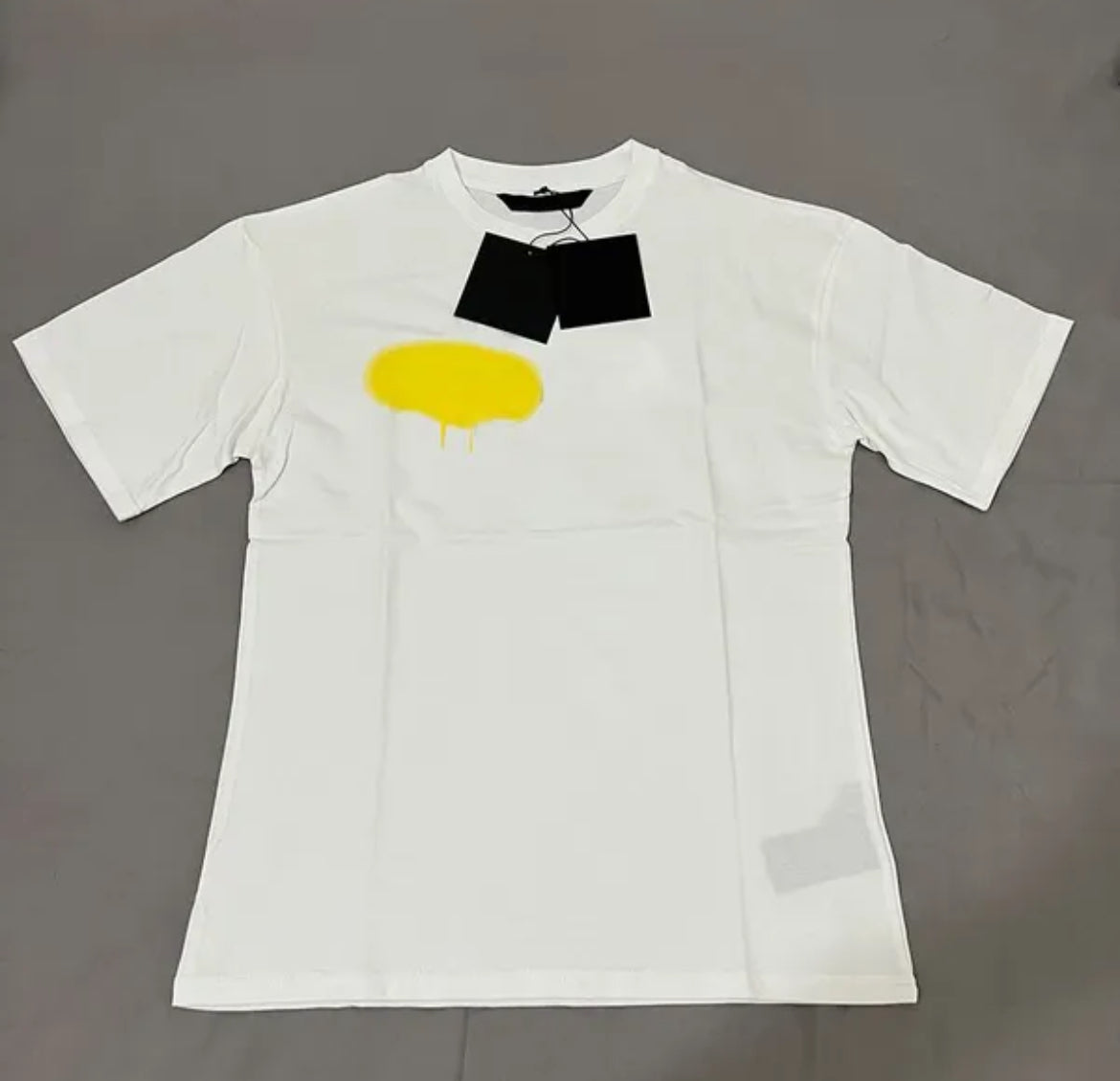 Designer Men's and Women's All White Coloured T-shirts Summer
Fashion Spray Painting Graffiti